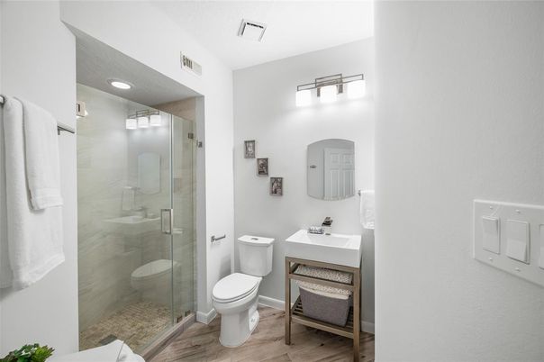 Bathroom, Glass Shower, Interior, Recessed Lighting, Wood Texture Flooring