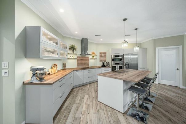 Interior, Kitchen, Pendant Lights, Recessed Lighting, Stainless Steel Appliances, Wood Texture Flooring