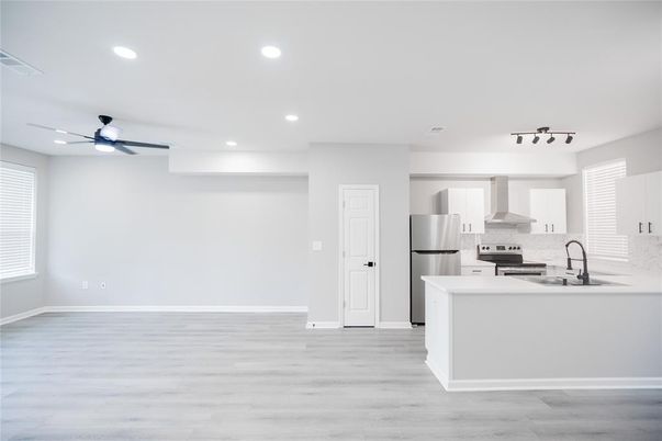 Interior, Kitchen, Recessed Lighting, Stainless Steel Appliances, Wood Texture Flooring