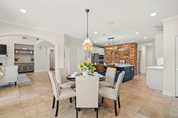 Dining room, Fireplace, Interior, Kitchen, Pendant Lights, Recessed Lighting, Stainless Steel Appliances, Stone Walls