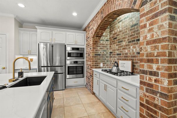 Interior, Kitchen, Recessed Lighting, Stainless Steel Appliances, Stone Walls