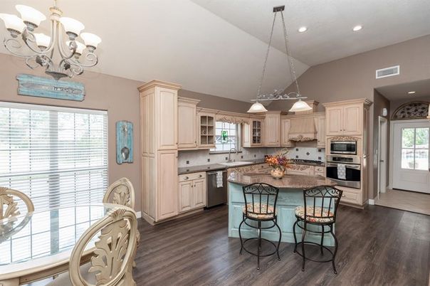 Chandelier, Interior, Kitchen, Pendant Lights, Recessed Lighting, Stainless Steel Appliances, Wood Texture Flooring