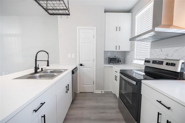 Interior, Kitchen, Marble Walls, Stainless Steel Appliances, Wood Texture Flooring