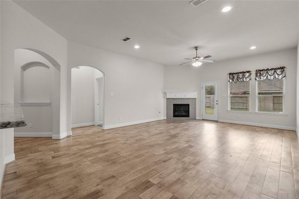 Empty room, Fireplace, Interior, Recessed Lighting, Wood Texture Flooring