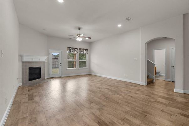 Empty room, Fireplace, Interior, Recessed Lighting, Wood Texture Flooring