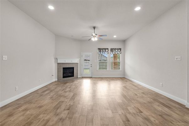 Empty room, Fireplace, Interior, Recessed Lighting, Wood Texture Flooring