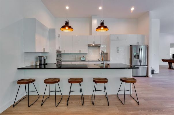 Interior, Kitchen, Pendant Lights, Recessed Lighting, Stainless Steel Appliances, Wood Texture Flooring