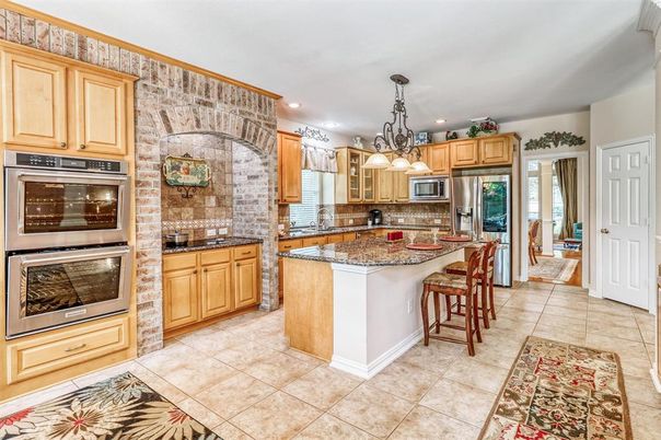 Interior, Kitchen, Recessed Lighting, Stainless Steel Appliances, Stone Walls