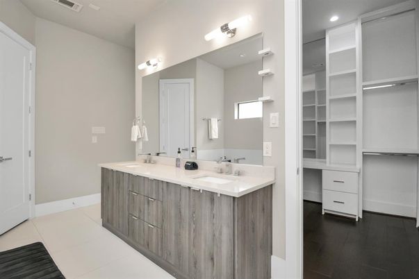 Bathroom, Dual Sink Vanities, Interior, Recessed Lighting, Walk-in Closets, Wood Texture Flooring
