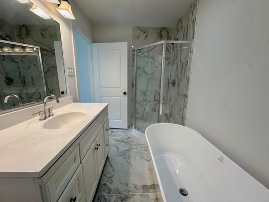Bathroom, Dual Sink Vanities, Free Standing Baths, Glass Shower, Interior, Marble, Marble Walls