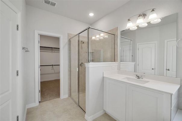 Bathroom, Dual Sink Vanities, Glass Shower, Interior, Recessed Lighting, Walk-in Closets