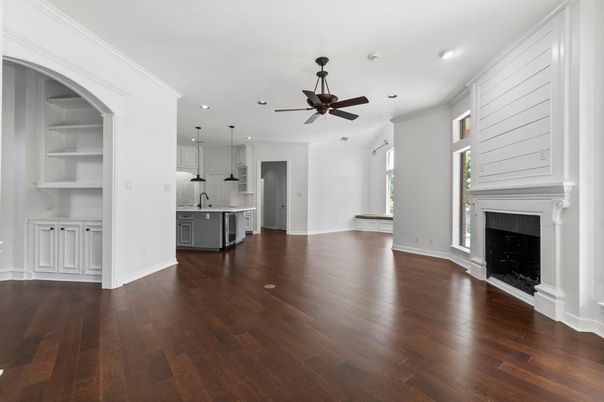 Empty room, Fireplace, Interior, Kitchen, Pendant Lights, Recessed Lighting, Wood Texture Flooring