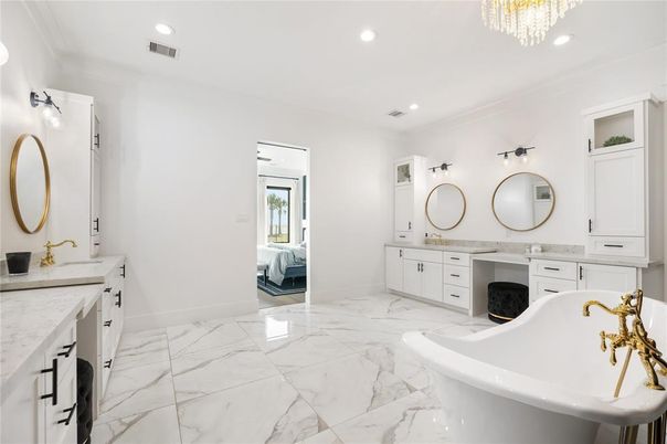 Bathroom, Chandelier, Dual Sink Vanities, Free Standing Baths, Interior, Marble, Recessed Lighting