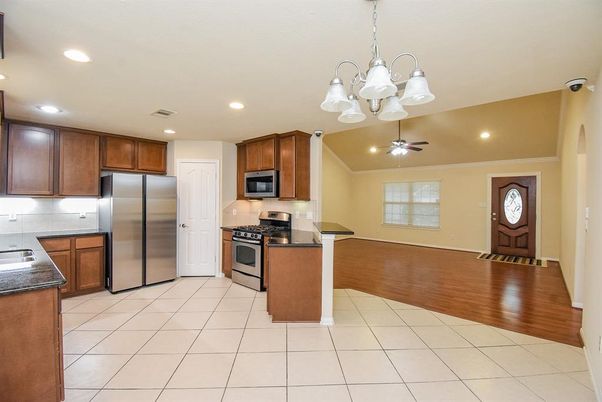 Chandelier, Interior, Kitchen, Recessed Lighting, Stainless Steel Appliances, Wood Texture Flooring