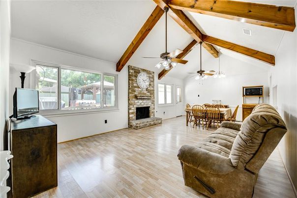 Dining room, Fireplace, Interior, Living room, Stone Walls, Wooden Beams, Wood Texture Flooring