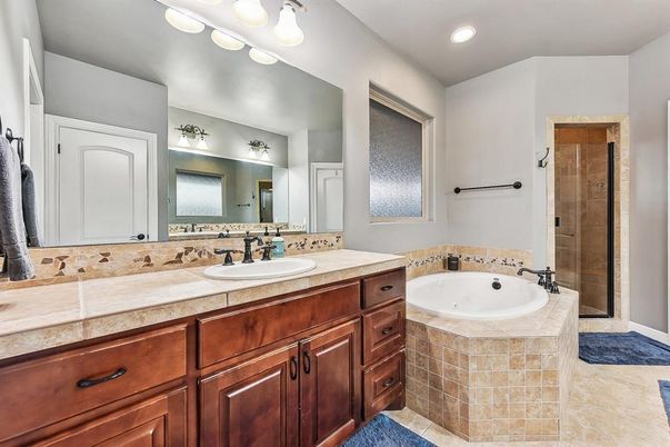Bathroom, Dual Sink Vanities, Interior, Recessed Lighting, Tile Countertops
