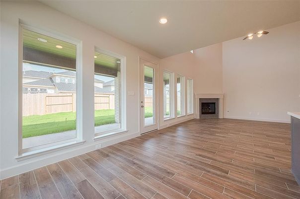 Empty room, Fireplace, Interior, Recessed Lighting, Wood Texture Flooring