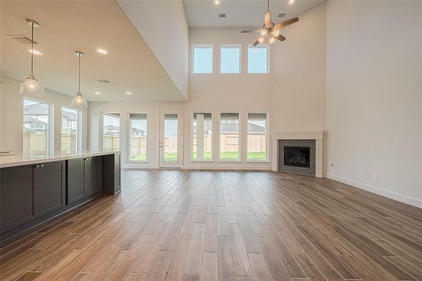 Empty room, Fireplace, Interior, Pendant Lights, Recessed Lighting, Wood Texture Flooring
