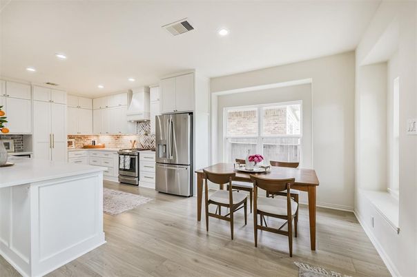 Dining room, Interior, Kitchen, Recessed Lighting, Stainless Steel Appliances, Wood Texture Flooring