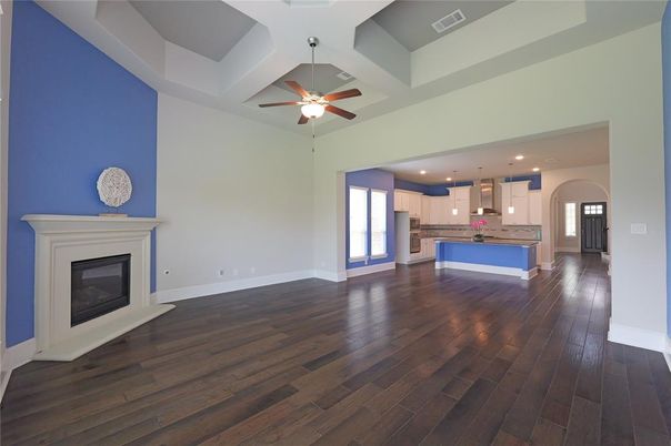 Empty room, Fireplace, Interior, Kitchen, Pendant Lights, Recessed Lighting, Wood Texture Flooring