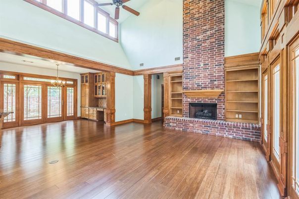 Chandelier, Empty room, Fireplace, Interior, Stone Walls, Wood Texture Flooring