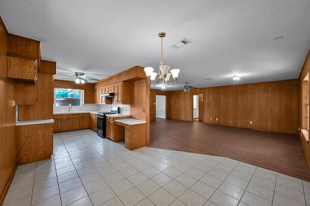 Chandelier, Interior, Kitchen, Stainless Steel Appliances, Wood Texture Flooring, Wooden Walls