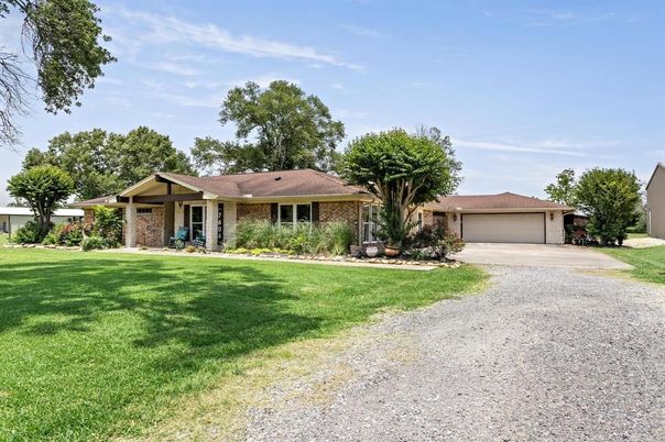 Attached, Backyard, Exterior, Facade, Brick Facade, Ranch