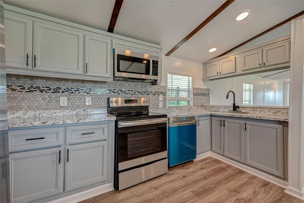 Interior, Kitchen, Recessed Lighting, Stainless Steel Appliances, Wood Texture Flooring