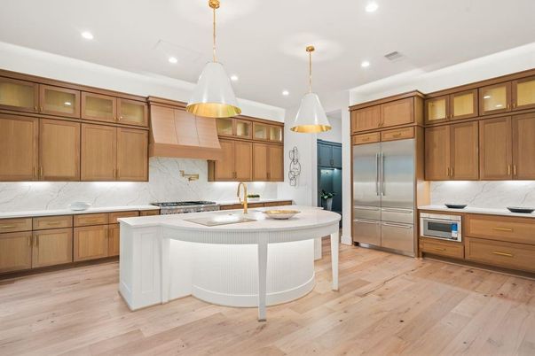Interior, Kitchen, Marble Walls, Pendant Lights, Recessed Lighting, Stainless Steel Appliances, Wood Texture Flooring