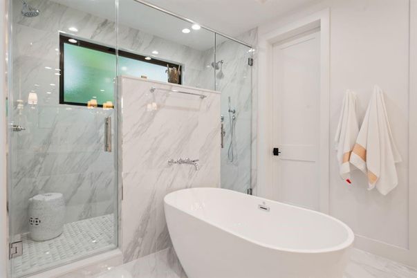 Bathroom, Free Standing Baths, Glass Shower, Interior, Marble, Marble Walls, Recessed Lighting