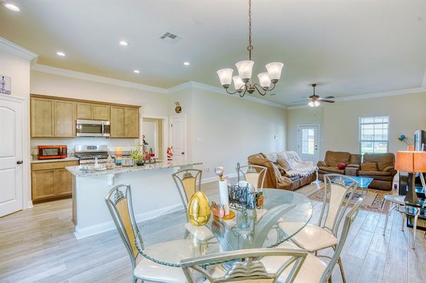 Chandelier, Dining room, Interior, Kitchen, Living room, Recessed Lighting, Stainless Steel Appliances, Wood Texture Flooring