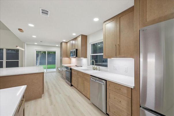 Interior, Kitchen, Pendant Lights, Recessed Lighting, Stainless Steel Appliances, Wood Texture Flooring