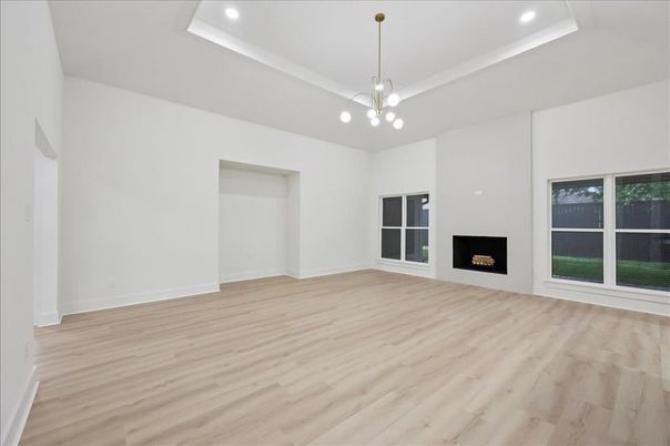 Empty room, Fireplace, Interior, Pendant Lights, Recessed Lighting, Wood Texture Flooring