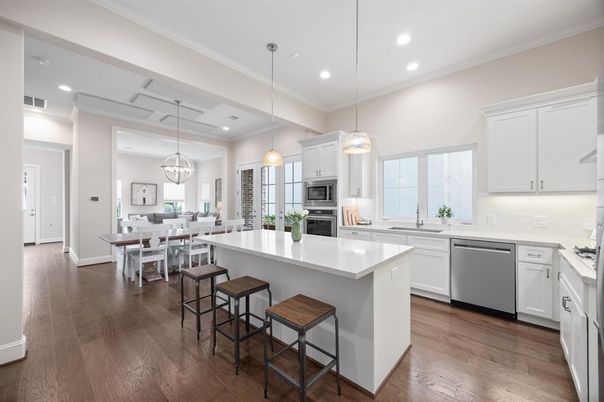 Dining room, Interior, Kitchen, Pendant Lights, Recessed Lighting, Stainless Steel Appliances, Wood Texture Flooring