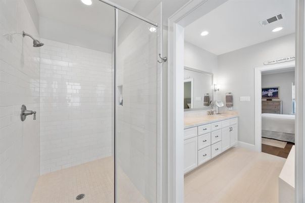 Bathroom, Dual Sink Vanities, Glass Shower, Interior, Recessed Lighting, Wood Texture Flooring