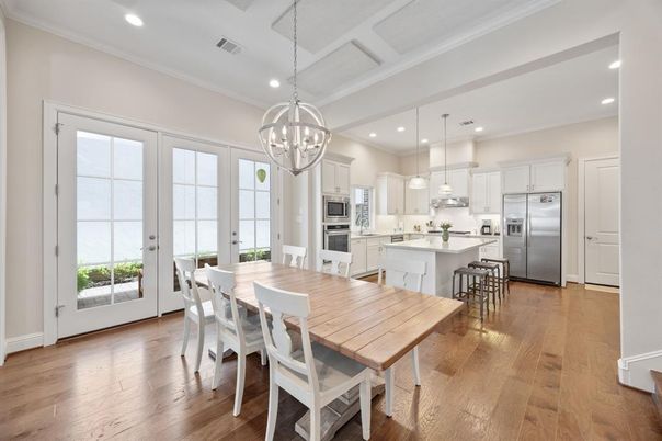 Chandelier, Dining room, Interior, Kitchen, Pendant Lights, Recessed Lighting, Stainless Steel Appliances, Wood Texture Flooring