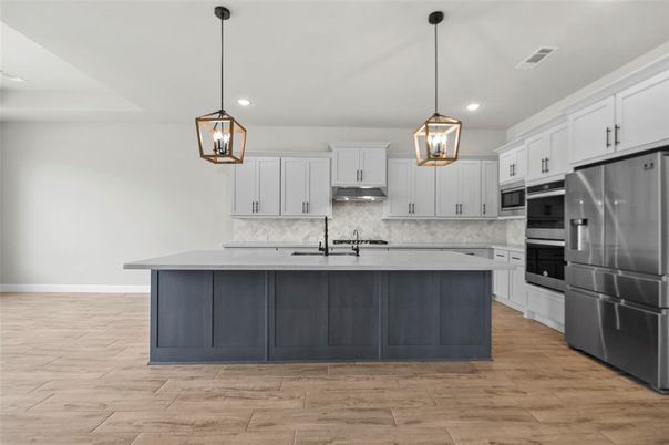 Interior, Kitchen, Pendant Lights, Recessed Lighting, Stainless Steel Appliances, Wood Texture Flooring