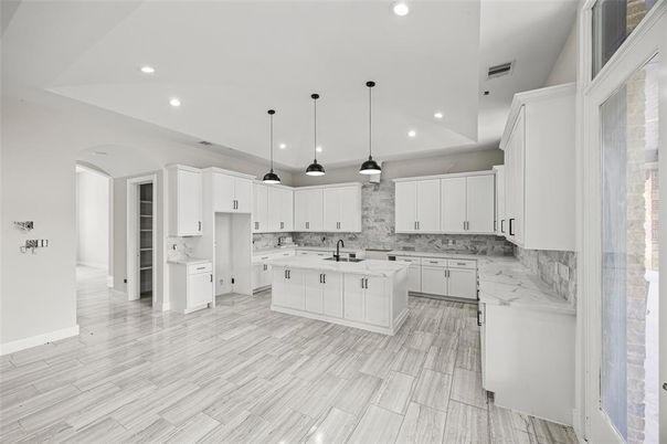 Interior, Kitchen, Marble Walls, Pendant Lights, Recessed Lighting, Wood Texture Flooring