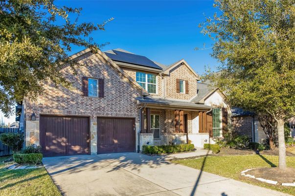 Attached, Exterior, Facade, Brick Facade, Solar Panels, Brick Traditional