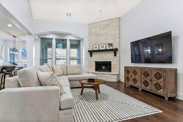 Dining room, Fireplace, Interior, Living room, Pendant Lights, Recessed Lighting, Stone Walls, Wood Texture Flooring
