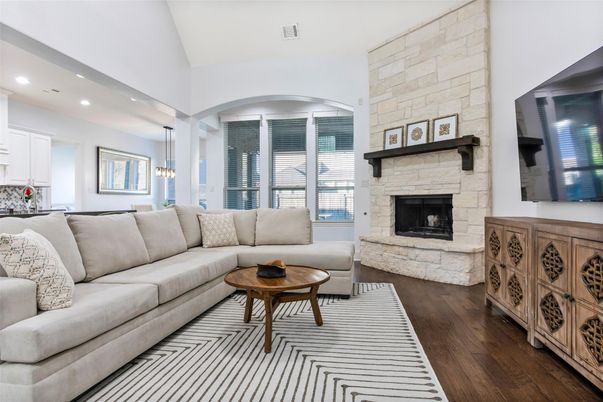Fireplace, Interior, Living room, Pendant Lights, Recessed Lighting, Stone Walls, Wood Texture Flooring