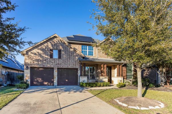 Attached, Exterior, Facade, Brick Facade, Solar Panels, Brick Traditional