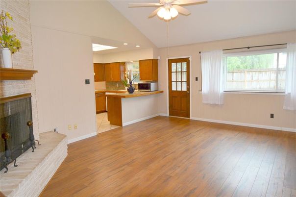 Fireplace, Interior, Kitchen, Recessed Lighting, Wood Texture Flooring