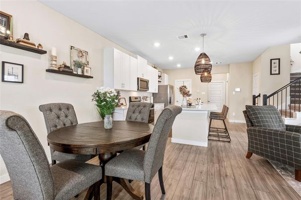 Dining room, Interior, Kitchen, Pendant Lights, Recessed Lighting, Stainless Steel Appliances, Wood Texture Flooring