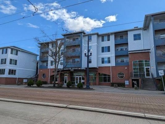 Exterior, Facade, Brick Facade, Condo Building