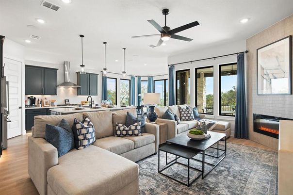 Fireplace, Interior, Kitchen, Living room, Pendant Lights, Recessed Lighting, Stainless Steel Appliances, Wood Texture Flooring
