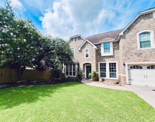 Attached, Backyard, Exterior, Facade, Brick Facade, Brick Traditional