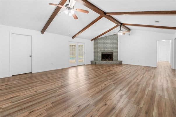 Empty room, Fireplace, Interior, Stone Walls, Wooden Beams, Wood Texture Flooring