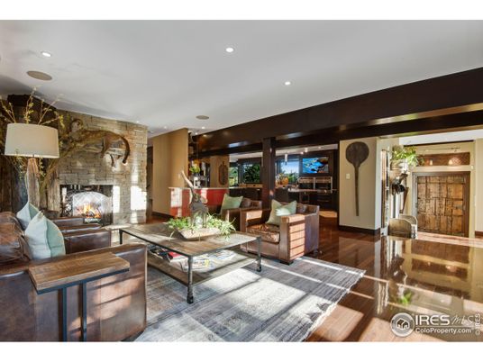 Fireplace, Interior, Living room, Recessed Lighting, Stone Walls, Wood Texture Flooring