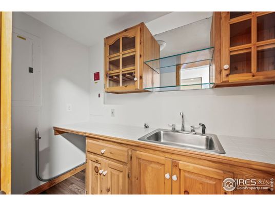 Interior, Kitchen, Tile Countertops, Wood Texture Flooring
